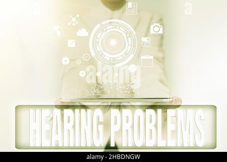 Handwriting text Hearing Problems. Word Written on is partial or total inability tolisten to sounds normally Business Woman Touching Digital Data On Stock Photo