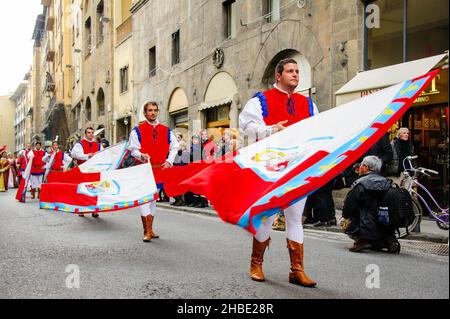 Florence, Italy - January 6, 2013: Flag throwing and waving parade as part of Epiphany day, with a grand procession in medieval costumes. Stock Photo