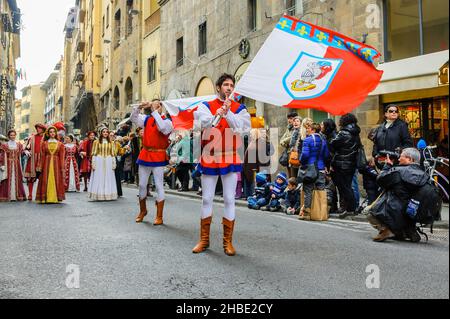 Florence, Italy - January 6, 2013: Flag throwing and waving parade as part of Epiphany day, with a grand procession in medieval costumes. Stock Photo