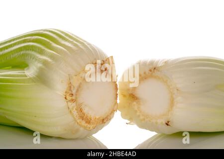 Two light green natural, juicy stalks of celery, close-up, isolated on white. Stock Photo