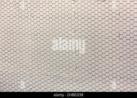 Construction mesh stretched over foam on a wall Stock Photo