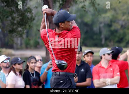 Golf - PNC Championship - The Ritz-Carlton Golf Club, Orlando, Florida, U.S. - December 19, 2021 Tiger Woods of the U.S. hits his tee shot on the 8th hole during the Pro-Am REUTERS/Joe Skipper