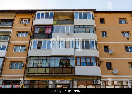 facade and windows of a old communistic house un romania Stock Photo