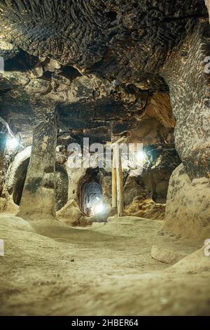 Inside of the Gumusler Monastery and underground cave city. Unesco World Heritage site in Central Anatolia, Cappadocia region. Stock Photo