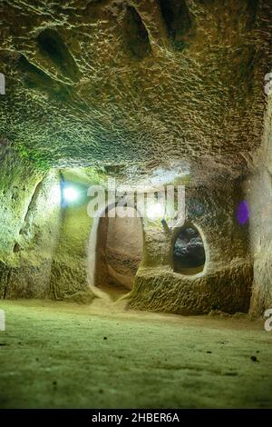 Inside of the Gumusler Monastery and underground cave city. Unesco World Heritage site in Central Anatolia, Cappadocia region. Stock Photo