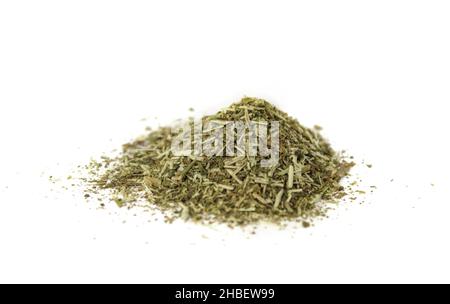 Dried chopped herb on white isolated background Stock Photo