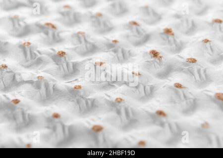 Soft wrinkled textured dotted wrapping paper. Grunge cardboard texture. Macro Stock Photo