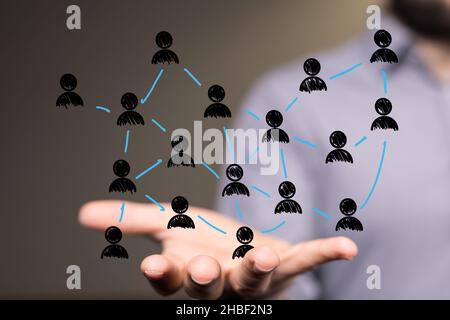 An abstract shot of male hands displaying contact icons connecting, networking in digital cyberspace Stock Photo