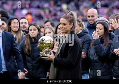 BARCELONA - DEC 4: Alexia Putellas lifts her Ballon d'Or Feminin trophy prior to the La Liga match between FC Barcelona and Real Betis Balompie at the Stock Photo