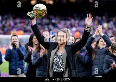 BARCELONA - DEC 4: Alexia Putellas lifts her Ballon d'Or Feminin trophy prior to the La Liga match between FC Barcelona and Real Betis Balompie at the Stock Photo