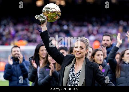 BARCELONA - DEC 4: Alexia Putellas lifts her Ballon d'Or Feminin trophy prior to the La Liga match between FC Barcelona and Real Betis Balompie at the Stock Photo