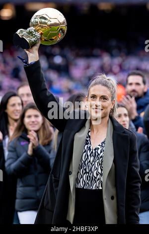 BARCELONA - DEC 4: Alexia Putellas lifts her Ballon d'Or Feminin trophy prior to the La Liga match between FC Barcelona and Real Betis Balompie at the Stock Photo