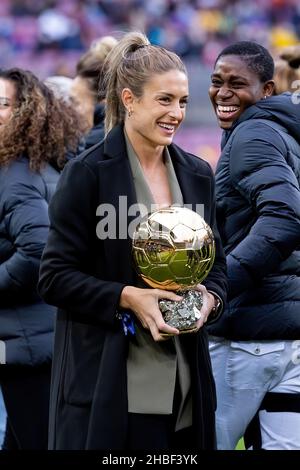 BARCELONA - DEC 4: Alexia Putellas lifts her Ballon d'Or Feminin trophy prior to the La Liga match between FC Barcelona and Real Betis Balompie at the Stock Photo