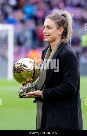 BARCELONA - DEC 4: Alexia Putellas lifts her Ballon d'Or Feminin trophy prior to the La Liga match between FC Barcelona and Real Betis Balompie at the Stock Photo