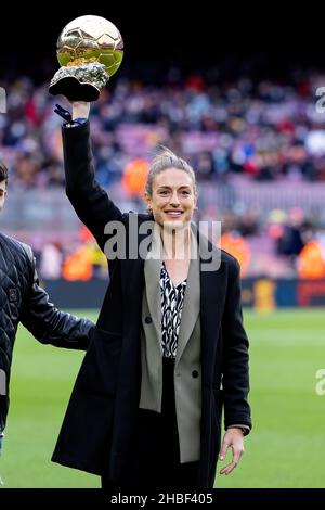 BARCELONA - DEC 4: Alexia Putellas lifts her Ballon d'Or Feminin trophy prior to the La Liga match between FC Barcelona and Real Betis Balompie at the Stock Photo