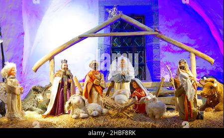 The birth of Jesus Crist scene. Holy Family and Jesus in garden. Stock Photo