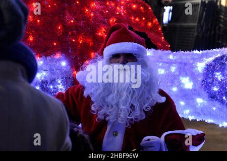 Marseille, France. 18th Dec, 2021. Santa Claus seen with Christmas decorations at the Place du Général De Gaulle in Marseille. Credit: SOPA Images Limited/Alamy Live News Stock Photo