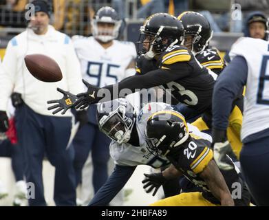 Tennessee Titans wide receiver Racey McMath (13) goes for a catch as he's  defended by Tampa Bay Buccaneers cornerback Dee Delaney (30) during their  game Saturday, Aug. 20, 2022, in Nashville, Tenn. (