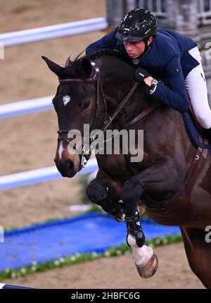 Royal Victoria Dock, United Kingdom. 19th Dec, 2021. London International Horse Show. Excel London. Royal Victoria Dock. Martin Fuchs (SUI) riding CONNER JEI during Class 16 - The Longines FEI Jumping World Cup. Credit: Sport In Pictures/Alamy Live News Stock Photo