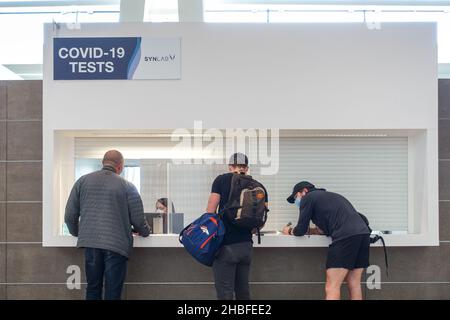 Passengers registering for a covid 19 antigen test at the terminal of Faro International Airport, Portugal Stock Photo