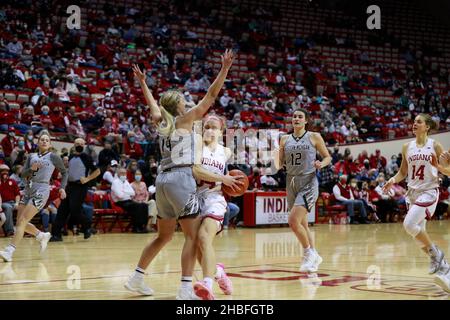 BLOOMINGTON, UNITED STATES - 2021/12/19: Indiana Hoosiers guard Grace Berger (34) is fouled by Western Michigan Broncos forward Abby Voss (14) during an NCAA women's basketball game on December 19, 2021 at Assembly Hall in Bloomington, Ind. IU beat Western Michigan 67-57. Stock Photo