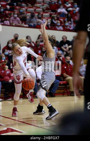 BLOOMINGTON, UNITED STATES - 2021/12/19: Indiana Hoosiers guard Nicole Cardano-Hillary (4) is fouled by Western Michigan University during an NCAA women's basketball game on December 19, 2021 at Assembly Hall in Bloomington, Ind. IU beat Western Michigan 67-57. Stock Photo