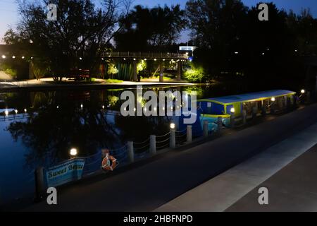The Tree Top Trail as seen across the St. Mary's River from the Sweet Breeze canal boat replica docked at Promenade Park in Fort Wayne, Indiana, USA Stock Photo