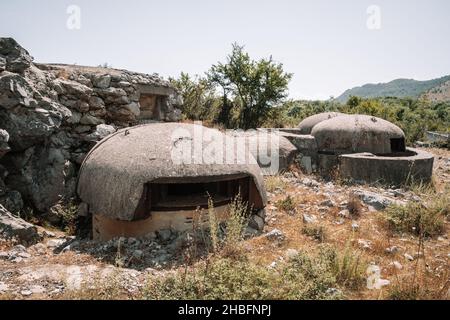 Old bunkers from Enver Hoxha dictatorship period in Albania Stock Photo