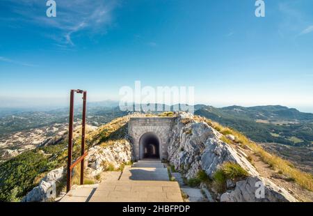 Lovcen National park. Dimly lit steep,white stone steps leading down a long narrow tunnel in the mountain from the Mausoleum of Petar II Petrovic-Njeg Stock Photo