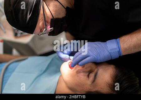 Visiting friendly and professional dentist. High quality photo Stock Photo