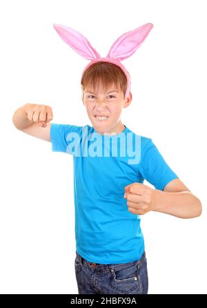 Kid with Bunny Ears threaten with a Fist Isolated on the White Background Stock Photo