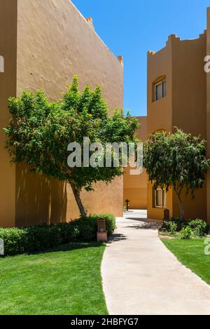 Hurghada, Egypt - May 28, 2021: View of the hotel's villa of the Stella Di Mare Beach Resort and Spa Makadi Bay. Architectural detail. Light and Shado Stock Photo