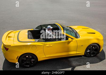 Kiev, Ukraine - June 19, 2021: Yellow Muscle Car Chevrolet Camaro Convertible in the city Stock Photo