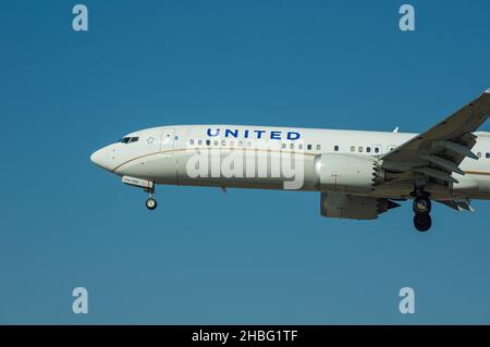 United Airlines Boeing 737 MAX 9 with registration N27503 shown arriving at LAX, Los Angeles International Airport. Stock Photo