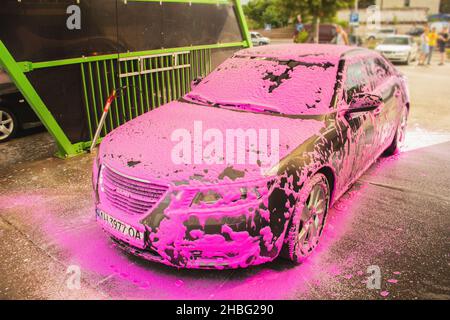 Woman in Pink Dress Washing Her Tiny Car with Nano Foam at Car Wash Stock  Image - Image of foam, auto: 250389741