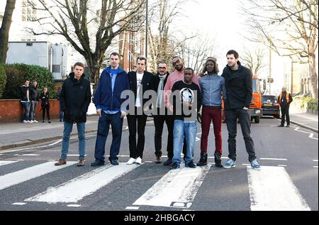 (L-R) Jamie T, Tim Westwood, Mark Ronson, Zane Lowe, Mr Jam, Tinchy Stryder, Labrinth and Calvin Harris pose on the Abbey Road zebra crossing as part of the Developing Musicians Music Industry Insight Sessions, expert-led practical workshops which are being staged at the Abbey Road Studios in London. Stock Photo