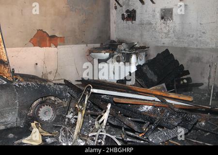 Interior of a garage following a fire, explosion or vandalism Stock Photo