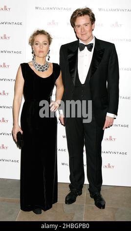 William Banks-Blaney and Gillian Anderson attending a private dinner held at Hansom Hall at St Pancras Renaissance Hotel in London. Stock Photo