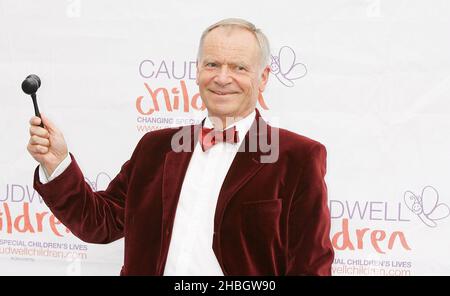 Jeffrey Archer arrives at the Caudwell Children Butterfly Ball at Battersea Evolution, London on May 31,2012. Stock Photo