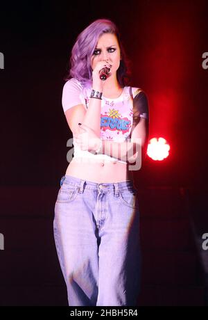 Perrie Edwards of Little Mix performs on stage at the HMV Hammersmith Apollo in London. Stock Photo