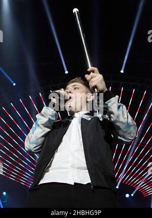 Nicholas McDonald performs on stage at Wembley Arena during the X Factor 2014 live tour in London. Stock Photo