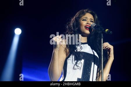 STRICTLY EDITORIAL USAGE RELATING TO THE TOUR AND NO USAGE AFTER 30 APRIL 2014 Tamera Foster performs on stage at the X Factor 2014 Live Tour at the 02 Arena in London.  Stock Photo