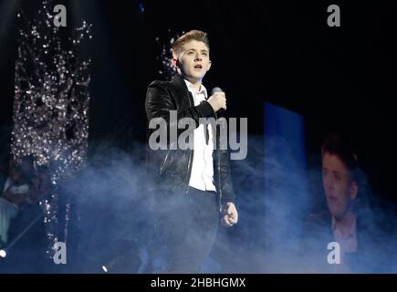 STRICTLY EDITORIAL USAGE RELATING TO THE TOUR AND NO USAGE AFTER 30 APRIL 2014.  Nicholas McDonald performs on stage at the X Factor 2014 Live Tour at the 02 Arena in London.  Stock Photo