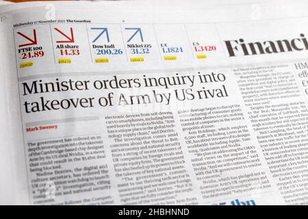'Minister orders inquiry into takeover of Arm by US rival' Guardian newspaper headline clipping article 17 November 2021 London England UK Stock Photo
