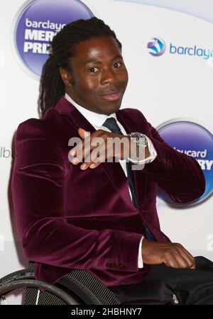 Ade Adepitan attends the Barclaycard Mercury Prize Awards at the Roundhouse in London. Stock Photo