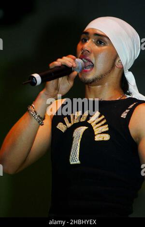 Billy Crawford performs live on stage supporting Liberty X at the Hammersmith Apollo, London. Half Length, bandana. Stock Photo