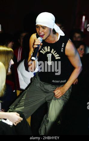 Billy Crawford performs live on stage supporting Liberty X at the Hammersmith Apollo, London. Half Length, bandana. Stock Photo