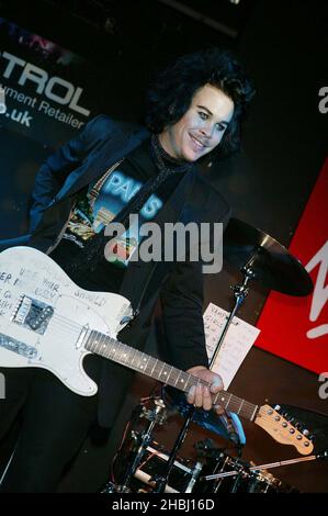 Luke Steele from Aussie psychedelic popsters Sleepy Jackson sign copies and perform hits from current album Lovers, at Virgin Megastore, London. Stock Photo