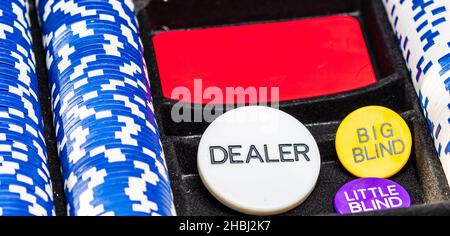 A stack of poker chips in a case Stock Photo