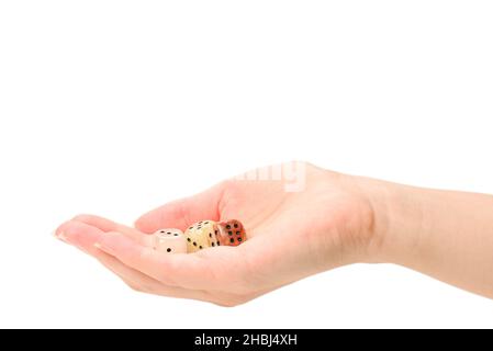 Woman throws dices isolated on white. Stock Photo